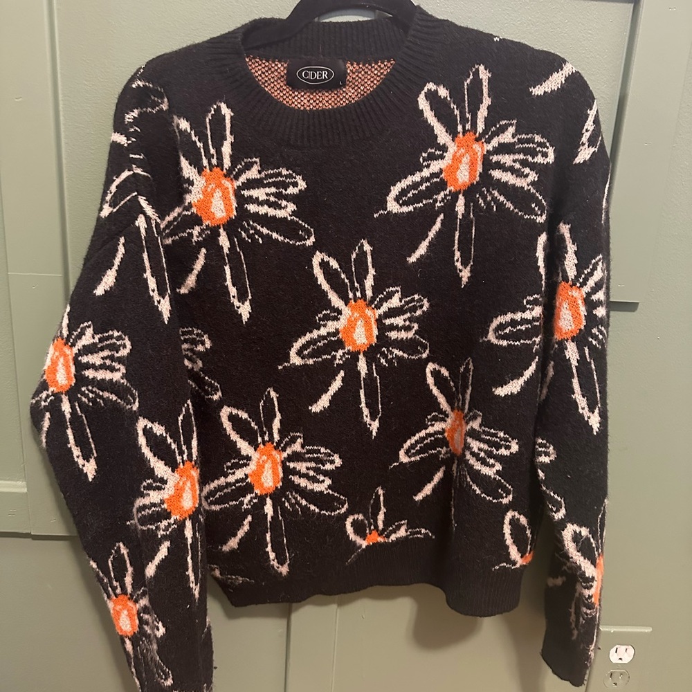 Black flowered sweater size L